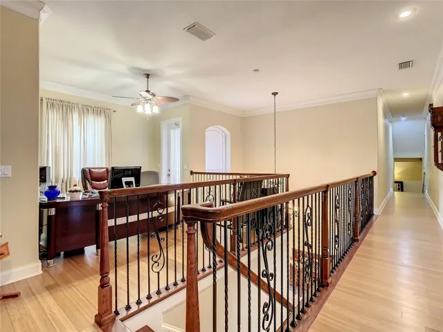 10549 Cory Lake Dr, second floor wrought iron balustrade, loft on left