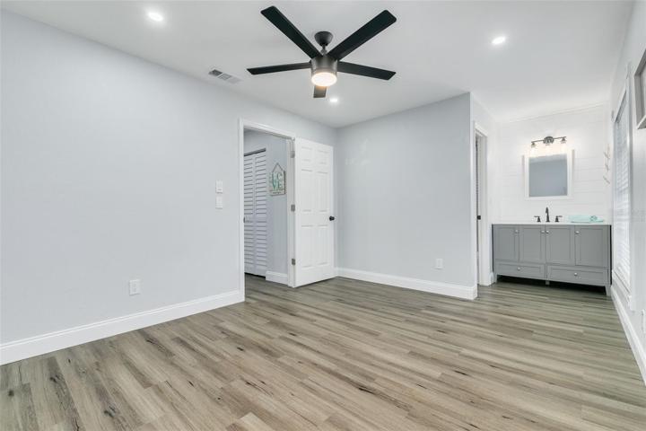 VIRTUALLY STAGED Second bedroom with sink