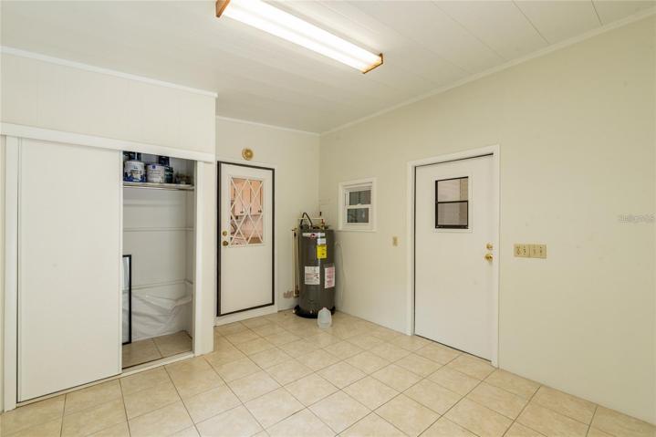 3rd bedroom in back - can be workout area / storage / or easily converted to drive in golf cart parking.