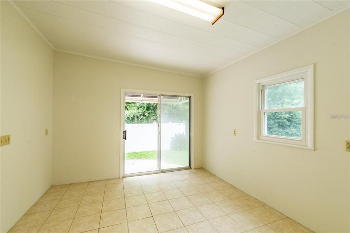 3rd bedroom in back - can be workout area / storage / or easily converted to drive in golf cart parking.