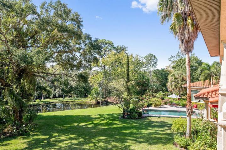 View from upstairs balcony to pool area and part yard !