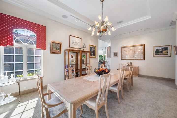 Spacious dining area , windows all around!
