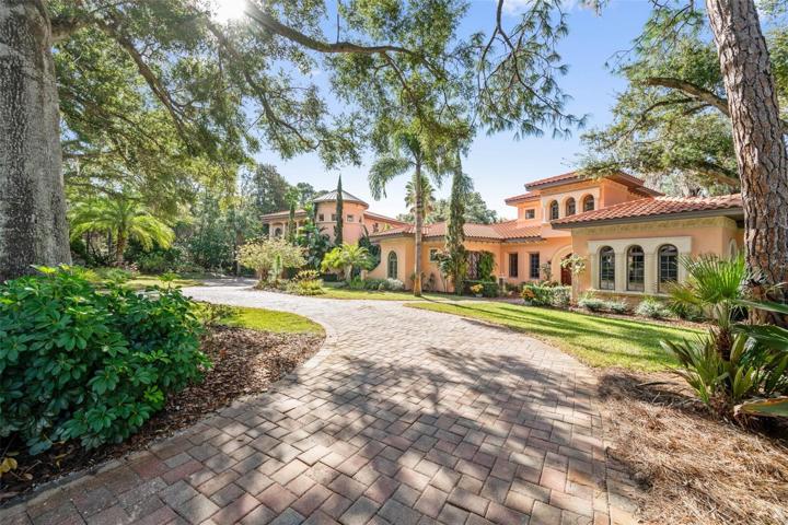 Side view with large circular driveway, park on street or on the private driveway !
