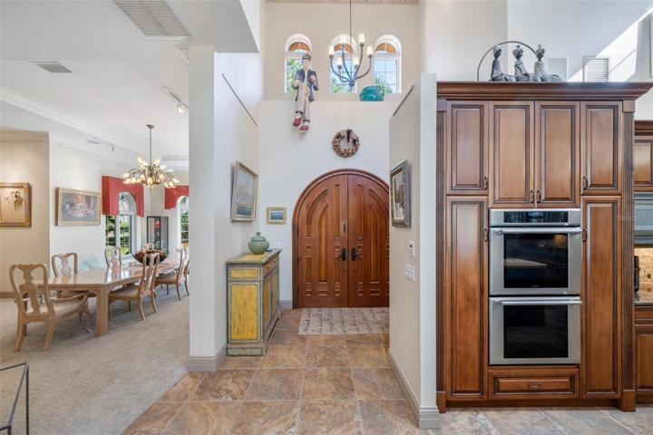 Front door middle, part kitchen right side to the dining room !