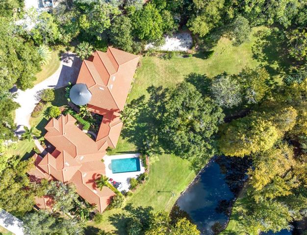 Larger drone view of part of the property !