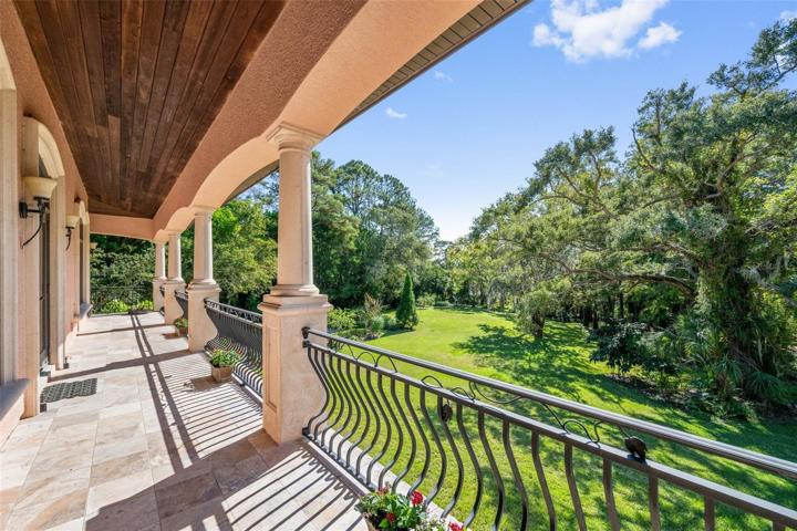 Part wrap around balcony with part view of the yard