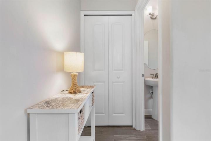 Foyer entry to half bath