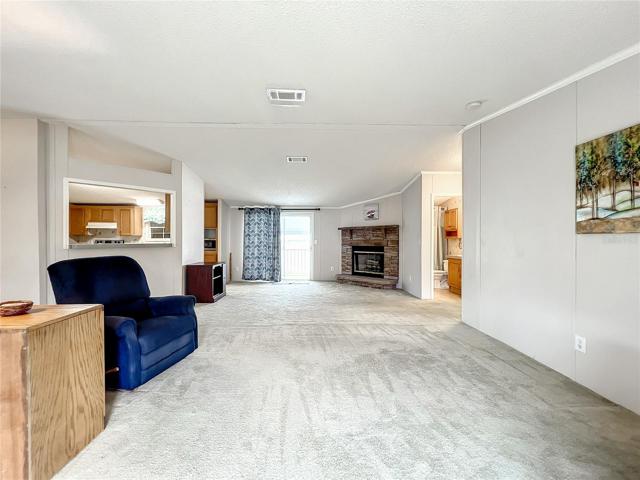 Living room with sliding doors to the carport