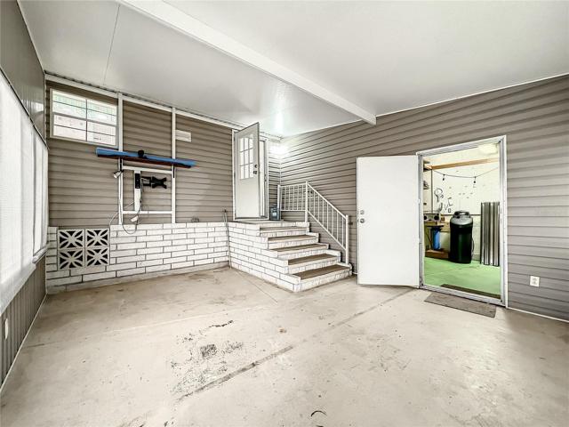 Large Florida room and view into the garage