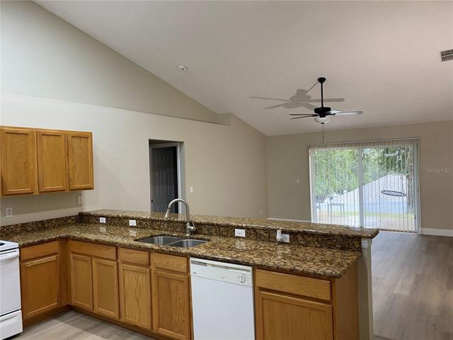 Kitchen looking in to family room