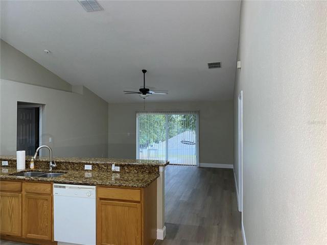 Kitchen looking into family room