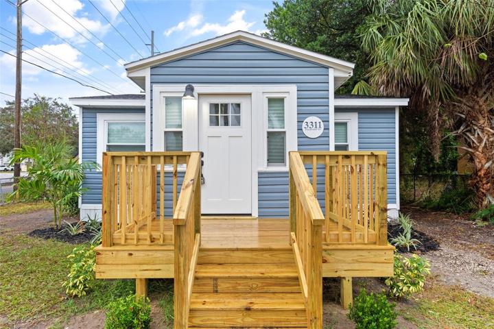 Front Exterior of Home- new windows, new door, new deck, new everything!