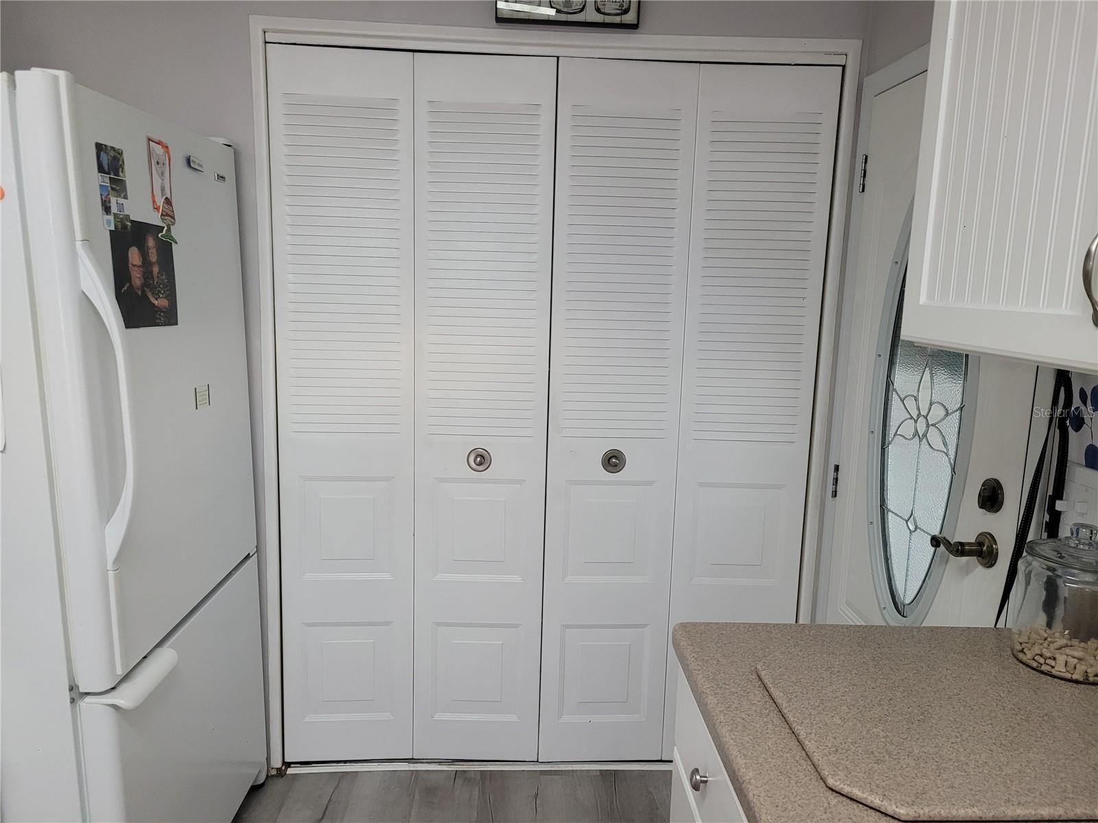 Kitchen's pantry and entrance to the house.