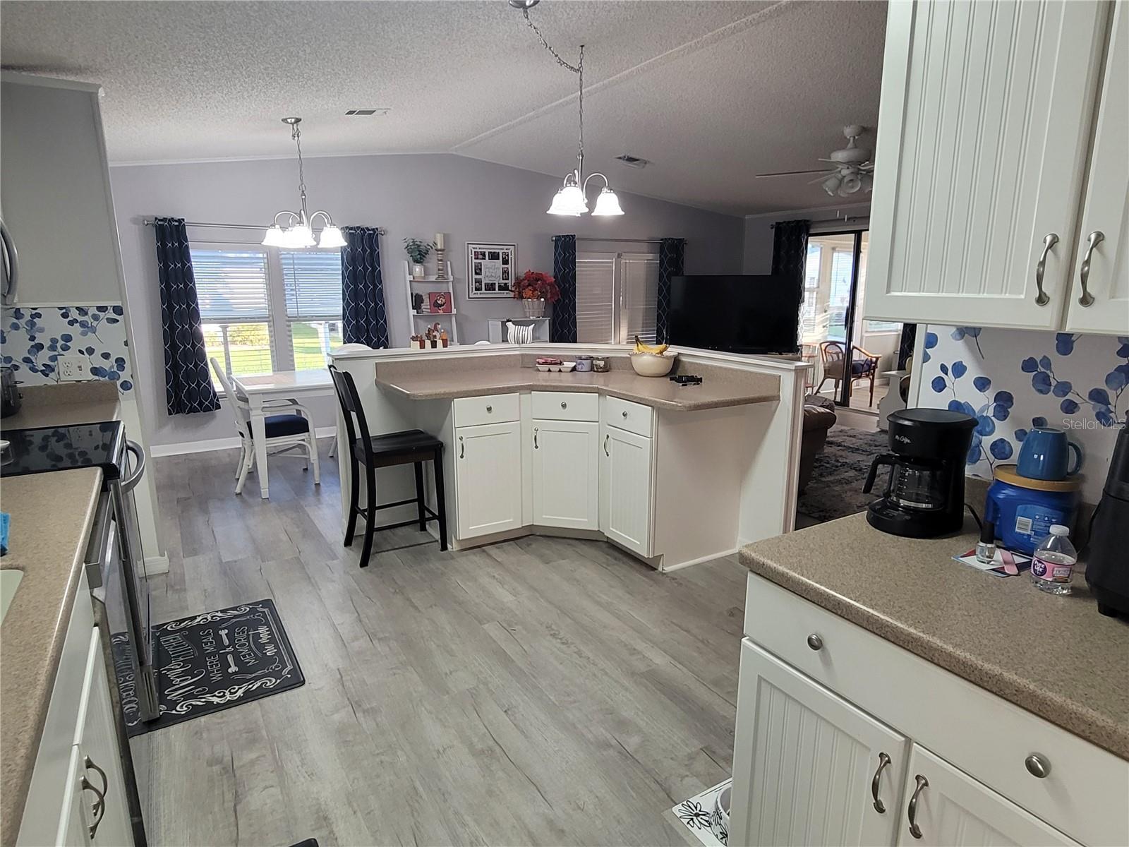 Kitchen with the corian countertop.