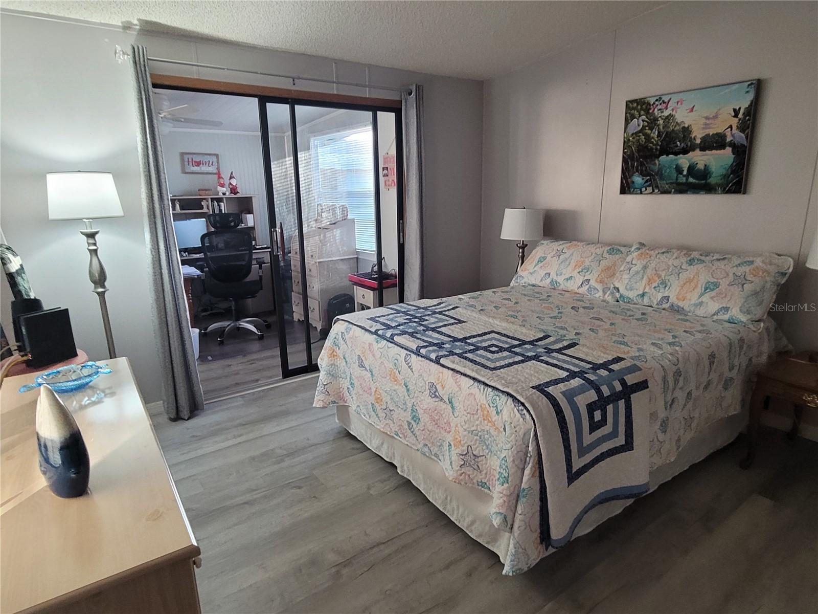 Guest bedroom and entry's to the Florida room and the office.