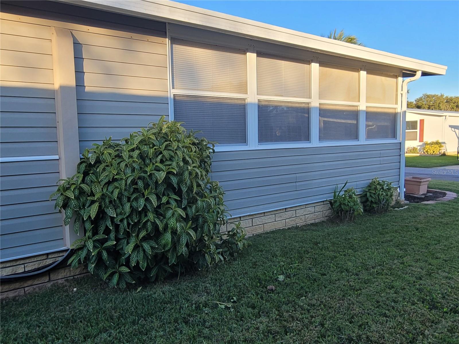 Florida room, side of the house (facing North)