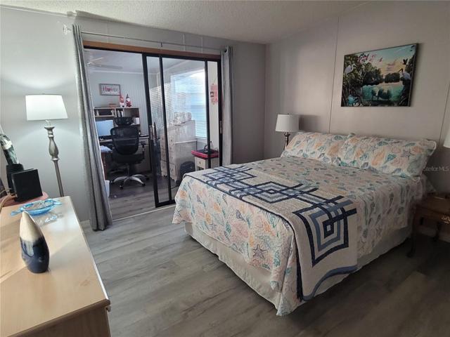 Guest bedroom and entry's to the Florida room and the office.