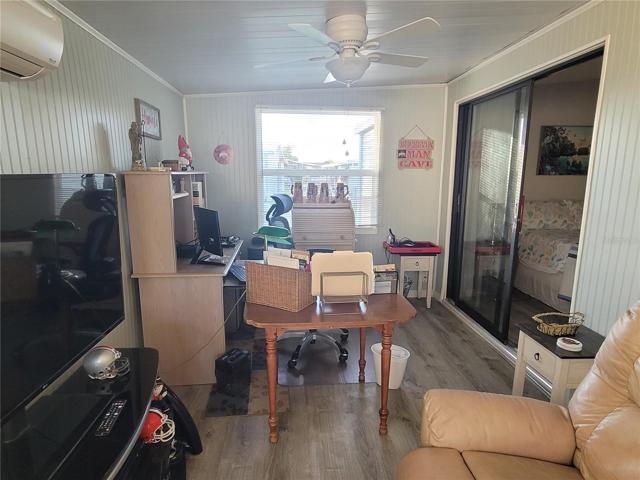 Two in one. Florida room and office. Entry's to the guest bedroom.