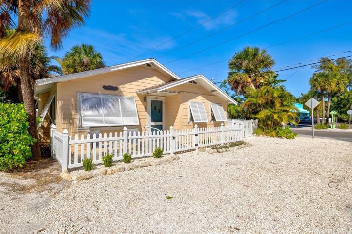 Front of home, corner lot on west side of Gulf Dr
