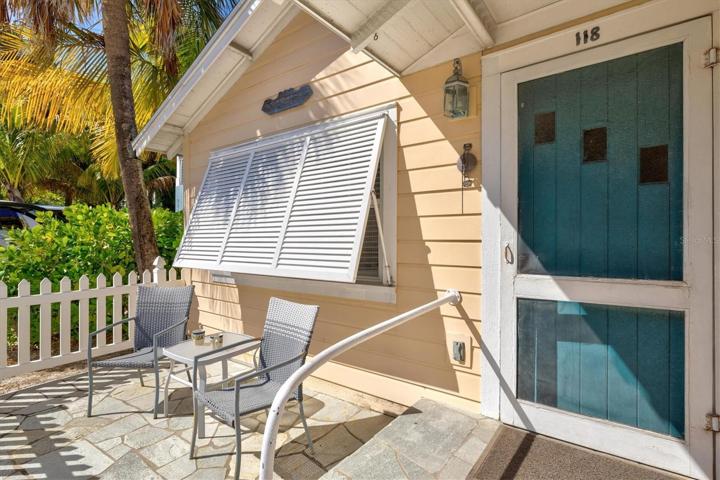 Love the vintage front door and screen door!