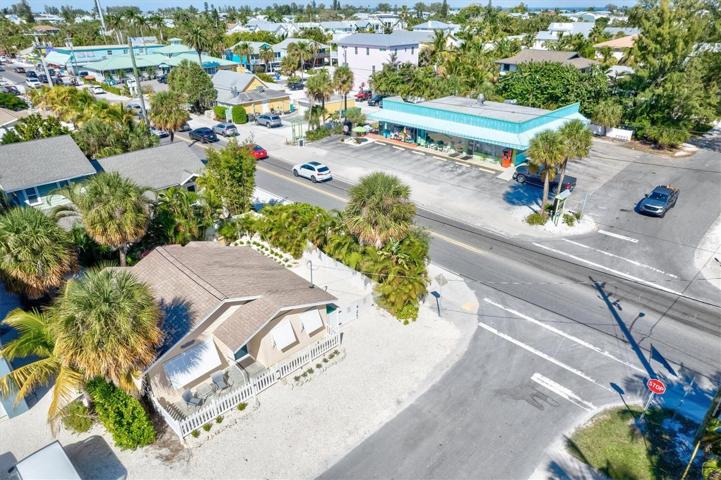Aerial of the home with Slim's Place directly across