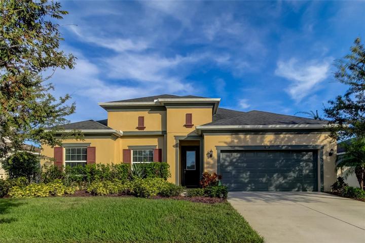 Front of Home with 3 Car Garage, Maintained Landscaping, 3 car Garage/Tandem