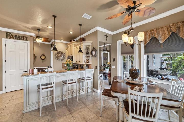 breakfast nook to right with aquarium window for perfect views