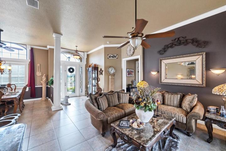 formal living room showing proximity to entry and dining