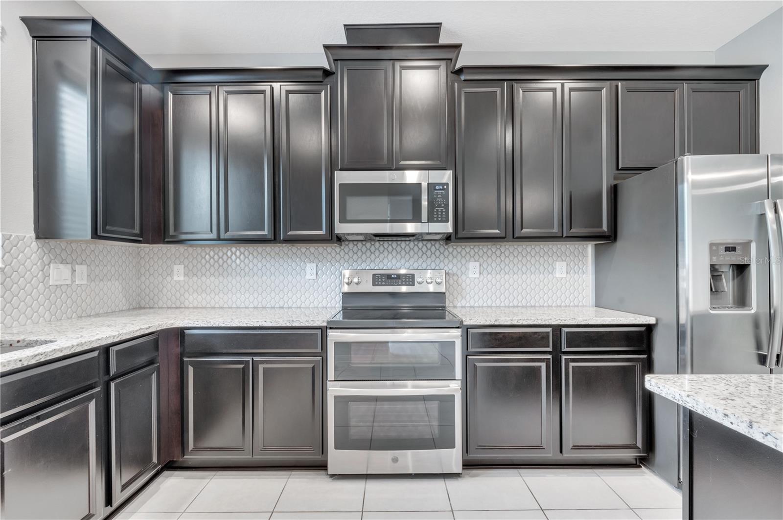 Kitchen with Granite Countertops and Double Oven