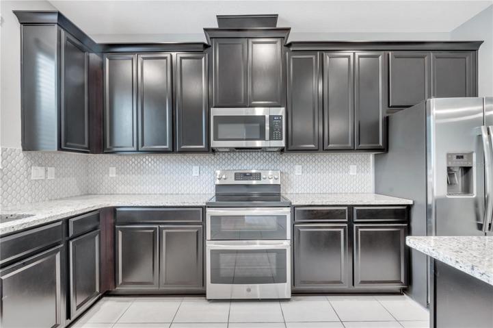 Kitchen with Granite Countertops and Double Oven