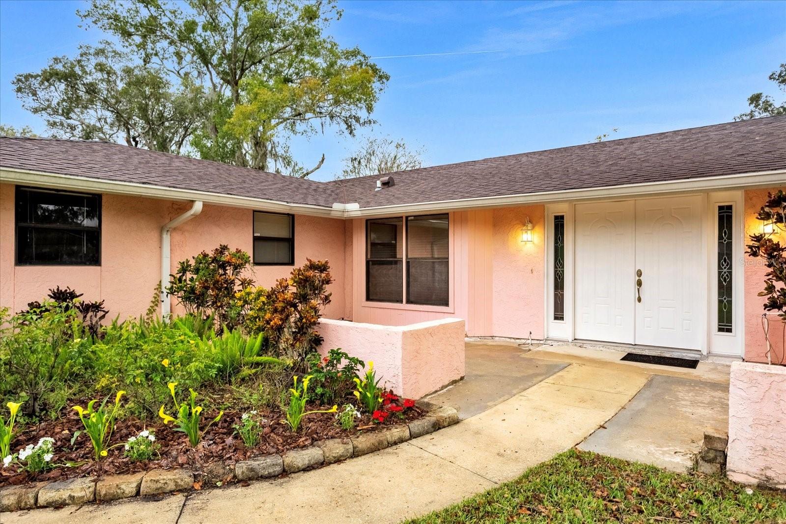 Enjoy outdoor living with this spacious front patio.