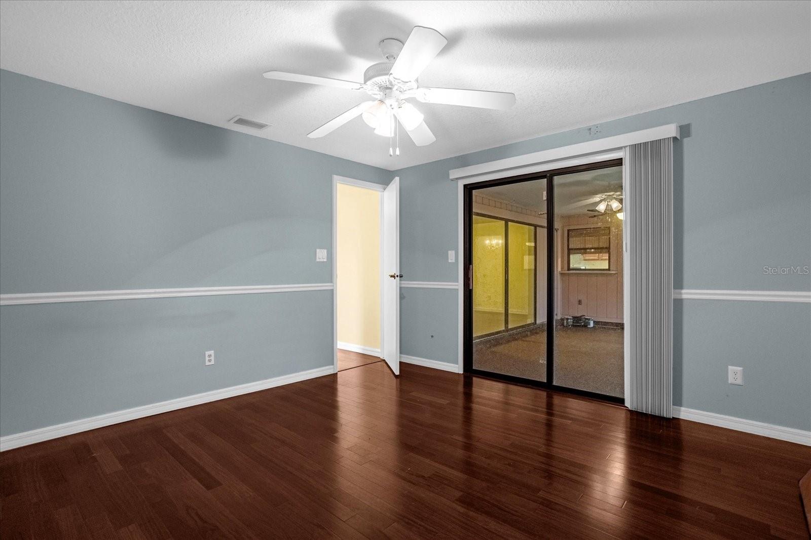Bedroom 3 with Prior Entry to Screened in Patio
