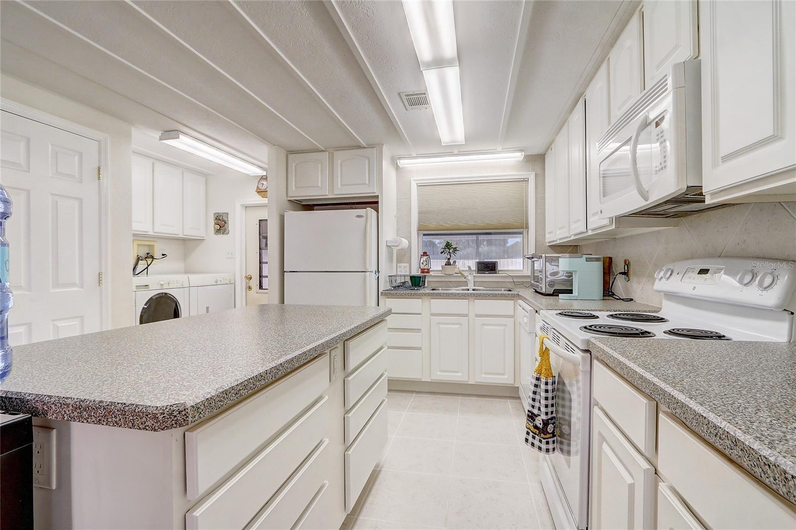 Generous kitchen with pantry and loads of counter space