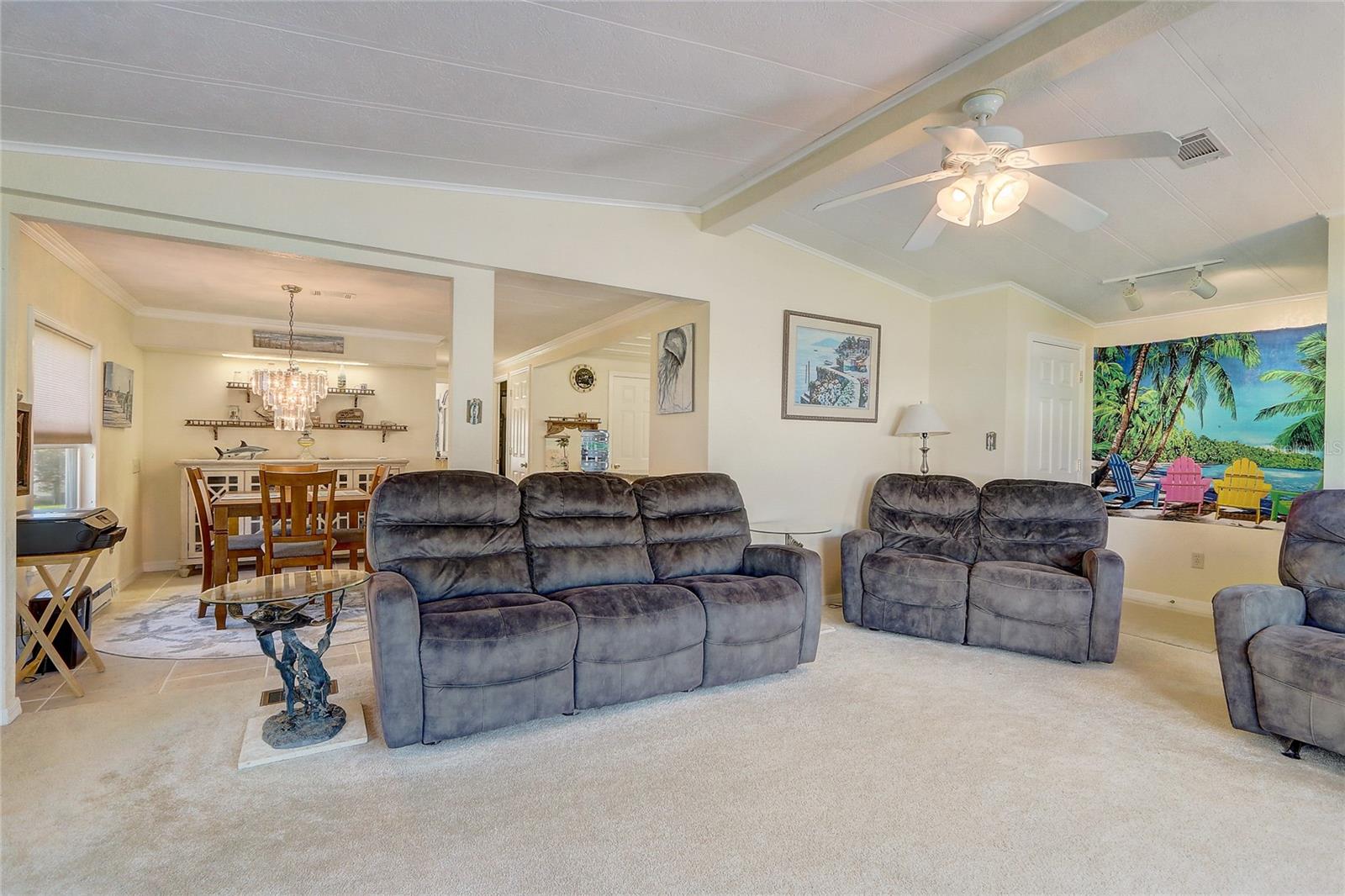 Living room opens to dining space