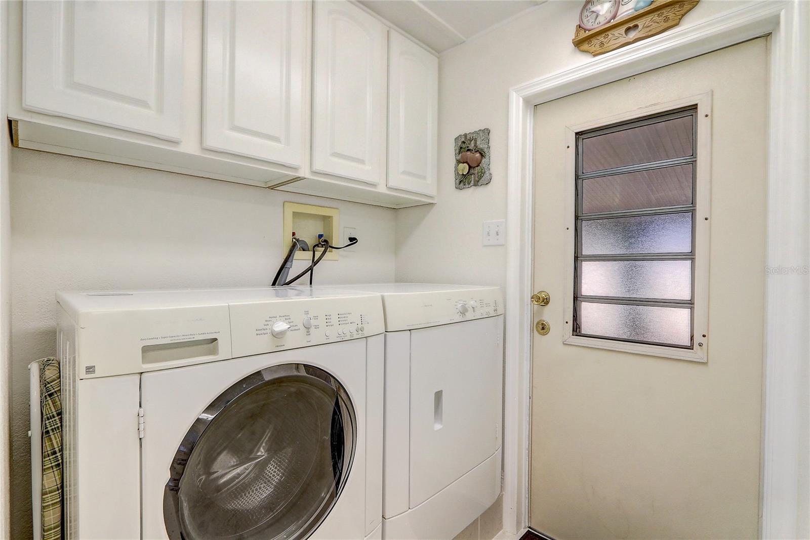 Laundry area in corner of kitchen
