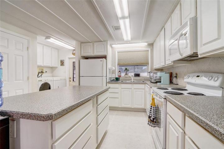Generous kitchen with pantry and loads of counter space
