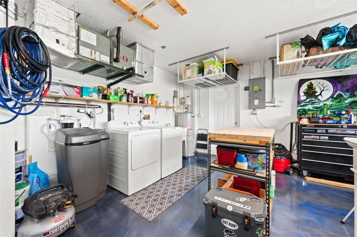 Garage with washer and dryer - 2021 water softener with UV Sanitizer