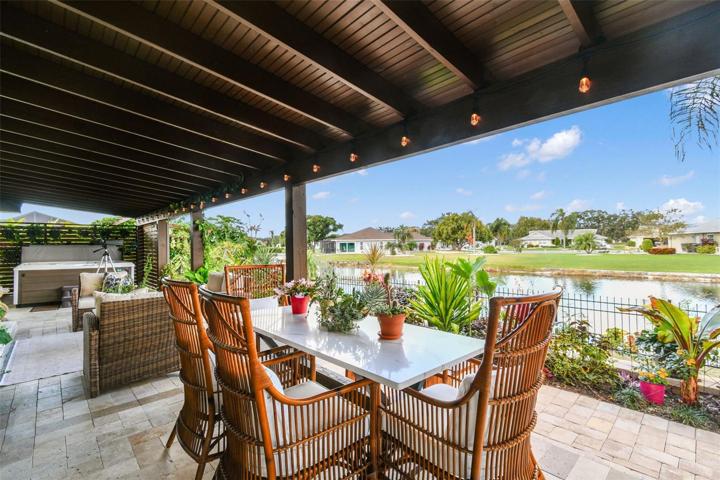 Lovely outdoor dining.  There are two sitting areas in the back.
