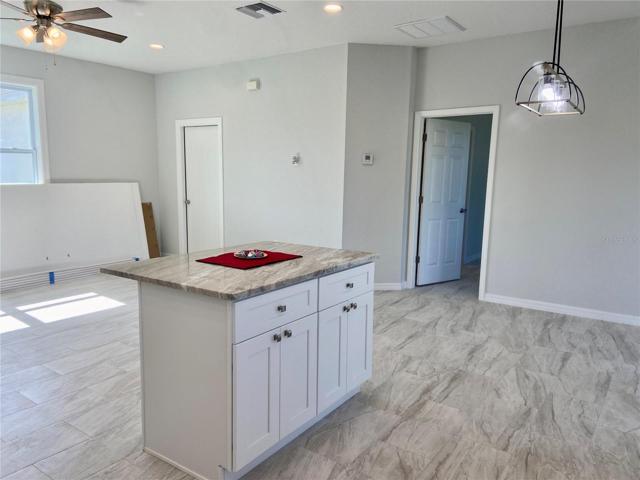 Dining Area to great room, kitchen island