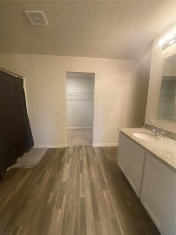 Primary bedroom bathroom and closet
