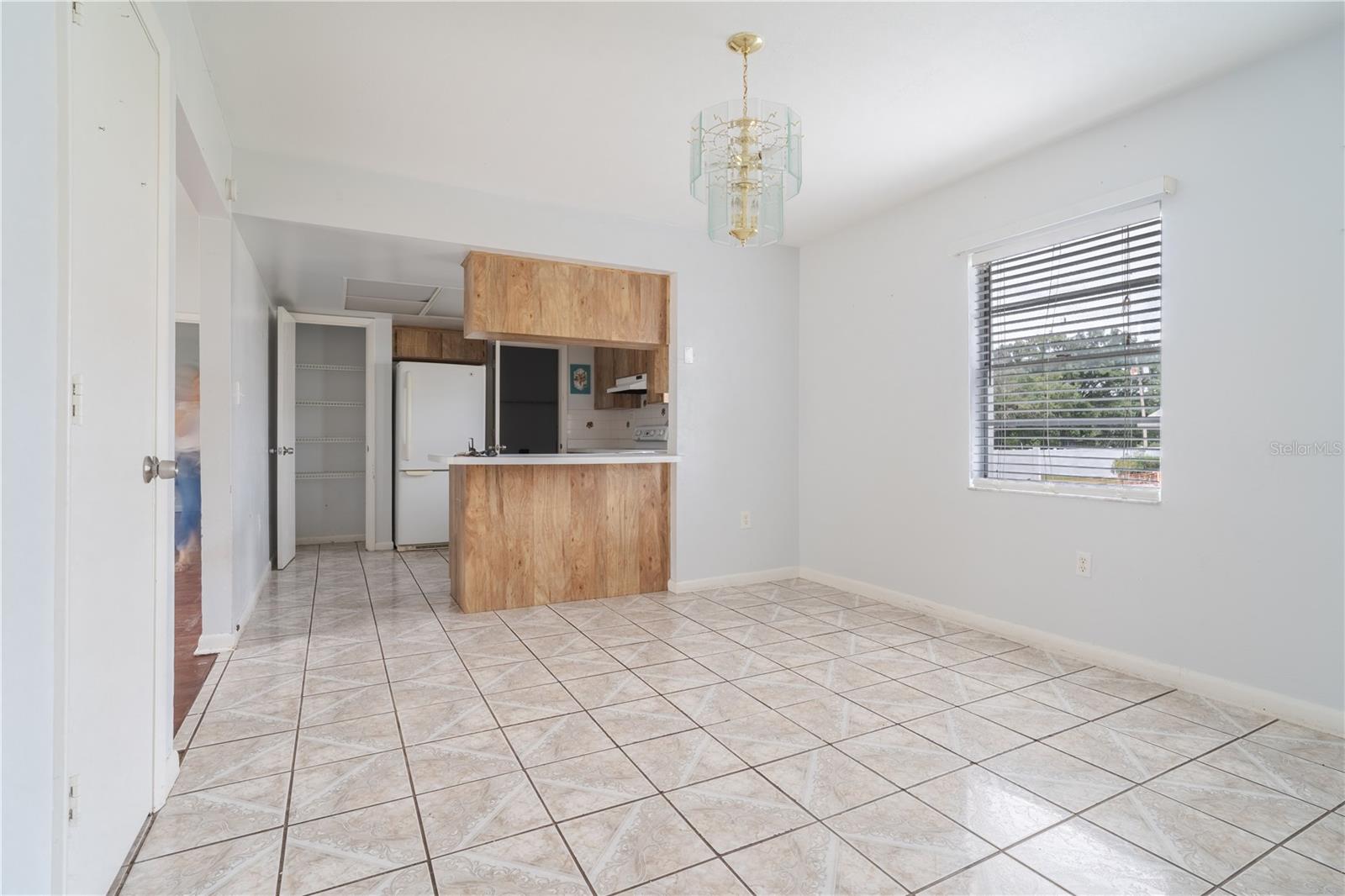 Living room open to kitchen and dining