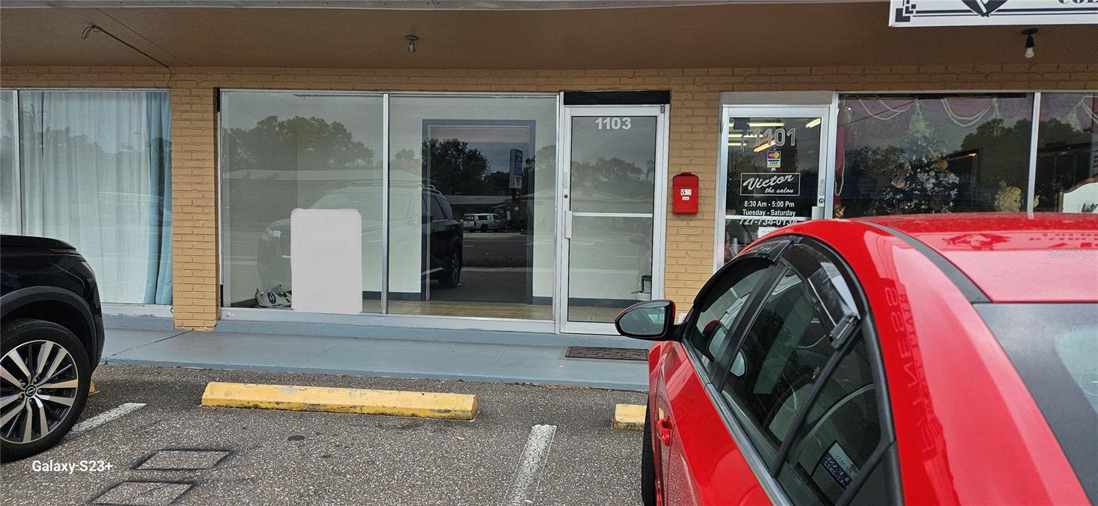 Front of building, showing #1103's storefront
