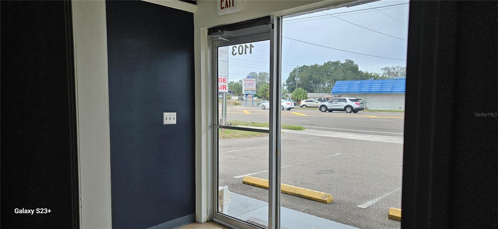 Inside front door, looking out onto Main St.