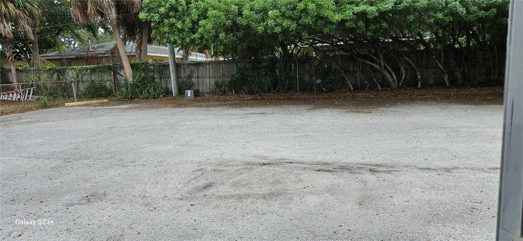Rear parking lot for tenants.