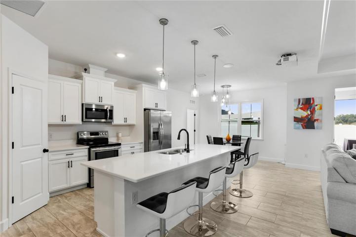 Stainless steel appliances, soft close cabinetry, and a large island to entertain.