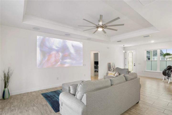 View of tray ceiling and in home speaker system in the great room.