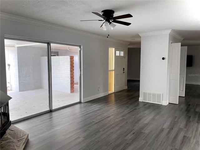 The second living room, looking toward the main entry door and kitchen entry