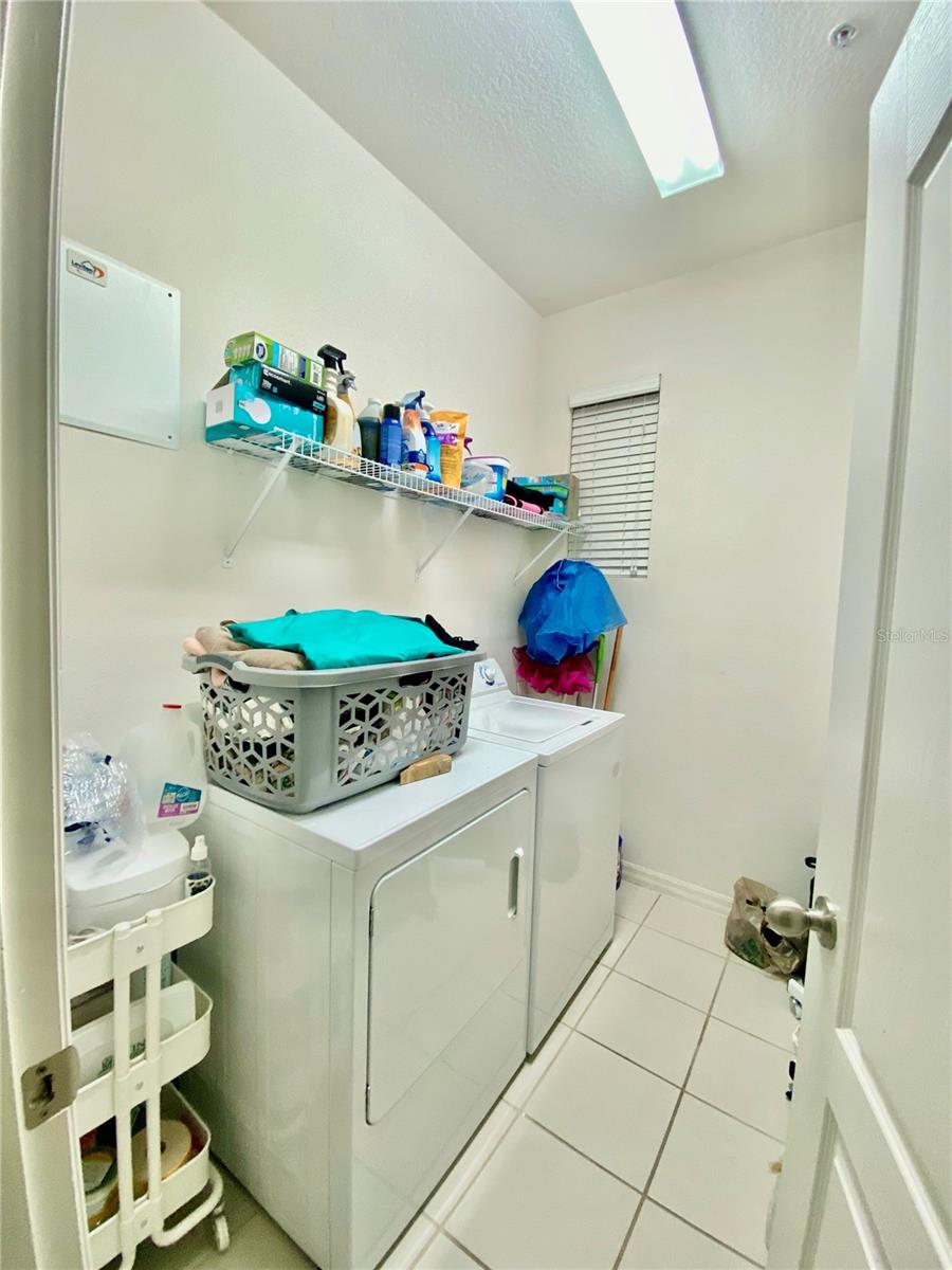 LAUNDRY ROOM with WASHER AND DRYER
