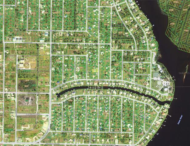 Aerial view zoomed out (yellow highlighted box is location).