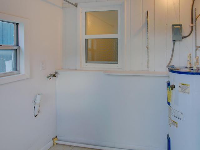 Inside washer and dryer hook up.